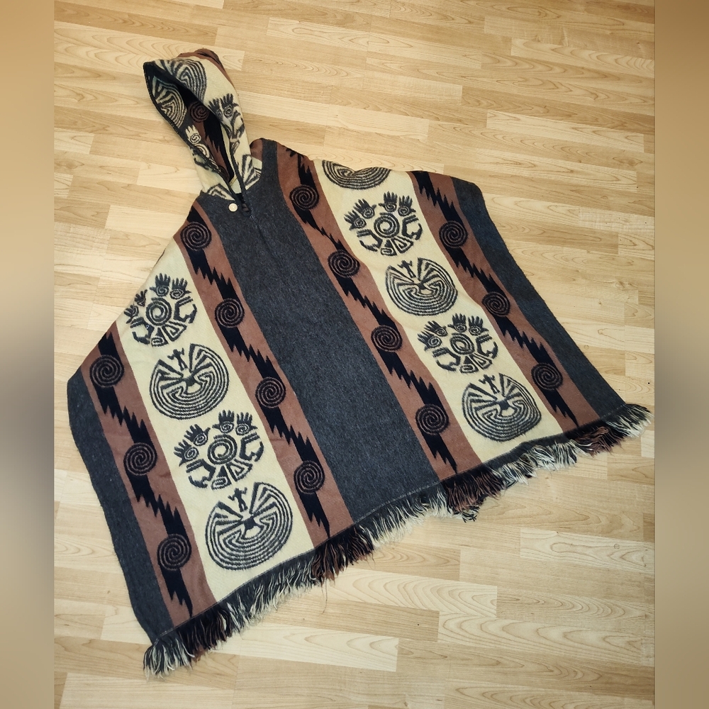 Tejidos Diaz Poncho Wool / Acrylic Blend. The Poncho is hooded with Fringe.